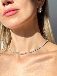 Stunningly elegant and crafted with precision, this tennis necklace of solid 14k gold or Sterling silver 925 features rows of dazzling moissanite diamonds for a luxurious, timeless look. With a total carat weight ranging from 13.75-78.00, this necklace is perfect for any special occasion or everyday wear. This exquisite necklace has high polished rhodium finish that gives it a stunning shiny look that lasts for many years. Every item, is shipped in gorgeous gift box so it could make a perfect gi Wedding Tennis Necklace, Moissanite Tennis Necklace, Single Line Diamond Necklace, Tennis Diamond Necklace, Glitz And Glamour Party, 2025 Rebrand, Tennis Necklace Diamond, Long Diamond Necklace, Silver Prom Jewelry