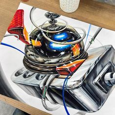 a drawing of an object with wires coming out of it and some other things on the table next to it