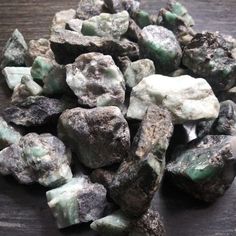 some green and white rocks on a table