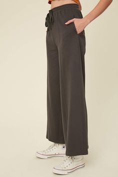 -Color: Charcoal -Wide leg cropped sweat pants -Cotton terry -Drawstring waistband -Side pockets -Wide leg -Content: 100% Cotton -Imported -Model is 5'10" 33-24-35 and wearing a size Small Wide Leg Joggers, Girl Sweat, Pants Cotton, Line Store, Sweat Pants, Clothing Boutique, Drawstring Waistband, How To Feel Beautiful, Perfect Outfit