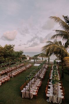 an outdoor wedding setup with tables and chairs