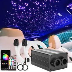 the interior of a car is decorated with star lights and remote controls, along with an array of accessories