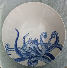 a bowl with an octopus painted on it