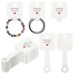 PRICES MAY VARY. [200Pcs Bracelet Display Cards] - Includes 200pcs handmade with love jewelry display cards. Every tag measures about 4" x 1.5"/10cm x 4cm.The bracelet display card has pre-drilled holes for hanging. [350(GSM) High-Quality Card Paper] - Our card is made of 350(GSM) high-quality card paper, non-toxic and odorless, firm and durable, and hard to tear or deformation. joycraft's bracelet cards are well-cut with smooth and burr-free edges. Our paper is of good quality and is not easily Bracelet Display Cards, Hair Accessories Display, Handmade Jewelry Display, Necklace Jewelry Display, Jewelry Display Cards, Bead Crafts Diy, Hanging Display, Handmade Packaging, Craft Packaging