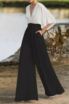 Details: Material: Polyester, Spandex Style: British Style, Elegant Pattern Type: Color Block Element: Pocket, Contrast Neckline: V Neck Sleeve Style: Batwing Sleeve Fit Type: Loose Profile: Wide Leg Type: Patchwork Size(in) Bust Waist Hips Sleeve Length Bottom Length S 31.5 25.2 34.6 13.8 55.5 M 33.1 26.8 36.2 14.2 56.3 L 34.6 28.3 37.8 14.6 57.1 XL 36.2 29.9 39.4 15 57.9 2XL 37.8 31.5 40.9 15.4 58.7 Tips:Due to the many variations in monitors, the color in the image could look slightly different, please take physical design and color shall prevail.Please allow 0.4"-1" differs due to manual measurement. Loose Romper, Outfit Elegantes, Women's Jumpsuit, Loose Jumpsuit, Jumpsuit Elegant, Elegant Color, 60 Fashion, Elegant Party, Spring Outfits Casual