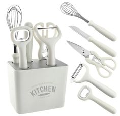 the kitchen utensils are organized in a holder