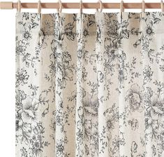 a curtain with floral print on it