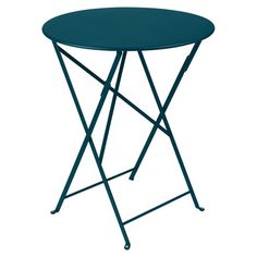 a small blue table with metal legs and a round top on an isolated white background