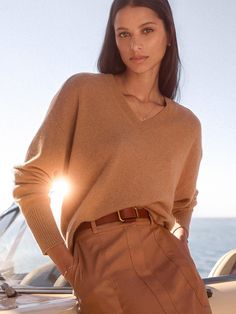 Our Leia Vee Sweater, designed in 100% Cashmere features a ribbed, v neckline, saddle shoulders and our signature center back seam detailing making it an everyday classic. Caramel Color Sweater, Chesnut Sweater, Carmel Sweater, Muted Autumn, Vegan Leather Skirt, Zendaya Style, Cozy Wear, Camel Sweaters, Closet Update