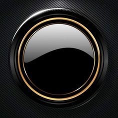 a black button with gold trim on a dark metallic textured background, it looks like something out of space