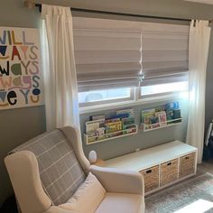 a living room filled with furniture next to a window