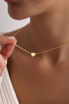 Welcome to the magical world of PKJewelry Love Pendant Necklace Minimalist Heart Necklace is perfect as a special gift for her. This Mini Love Necklace is a great choice as a gift for Mother's Day, Birthday, Anniversary, Valentine's Day, Christmas. High quality heart necklace is specially prepared for you with great care. The gold plating on it is much thicker than other platings. Therefore, it is a nice gift to be used for a long time. Our products do not tarnish and are anti-allergic. - Our chains are sent with 16 inch and 2 inch extension chain. You can adjust it to the size you want. If you want it shorter or longer, please contact us.   All Our Heart Locket Necklace  https://www.etsy.com/shop/PKJewelryNecklace?ref=shop-header-name&listing_id=1794870106&from_page=listing&search_query=h Small Heart Necklace, Tiny Heart Necklace, Mini Love, Special Gifts For Her, Heart Locket Necklace, Necklace Heart, Necklace Minimalist, Tiny Heart, Wedding Jewellery Necklace