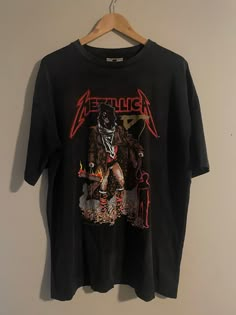 "Vintage Metallica Shirt  - Double stitched  - 1994© licensed to Giant  - Winterland tagged  - Double sided graphic  - Unforgiven design  - Pushead artwork  - Faded and distressed vintage  Size: L fits XL  25\" pit to pit  30.5\" shoulder to waist  Good vintage condition  Small rip on sleeve seam (from puppy bite) no holes  No stains" Metallica Band Shirt, 90s Grunge Shirts, Grunge Fan Merchandise Shirt With Screen Print, Grunge Style Fan Merchandise Shirt With Screen Print, Band Merch T-shirt For Fan Merchandise, Grunge Graphic Print Shirt For Fans, Grunge Shirt With Front Print, Grunge Tops With Sublimation Print For Fan Merchandise, Band Merch Shirt With Sublimation Print For Streetwear