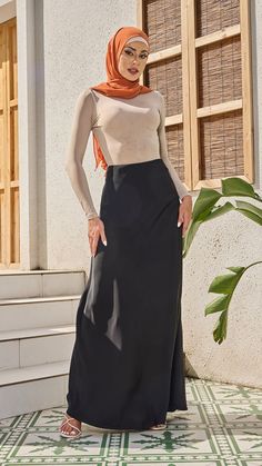 The Stunning Satin maxi skirt is an ode to this season's soft tailoring and feminine-cut finishes. It is a luxurious take on; rendered in elegant satin, there’s more to this piece than meets the eye. Soft, floaty, and a key trend piece this year, the satin skirt is the perfect addition to your wardrobe. Chic Satin Maxi Length Skirt, Chic Relaxed Fit Maxi Skirt, Sleek Satin Maxi Skirt, Chic Satin Maxi Skirt, Satin Flared Maxi Skirt, Sleek Satin Maxi Skirt With Lining, Relaxed Fit Satin Flared Maxi Skirt, Asymmetrical Satin Maxi Skirt, Relaxed Satin Maxi Flared Skirt