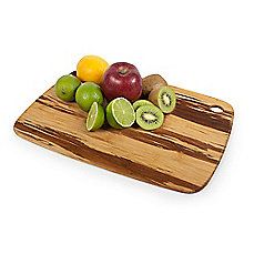 a wooden cutting board with fruit on it