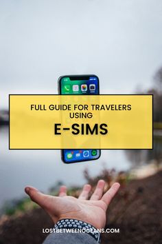 someone holding up their cell phone with the text full guide for travelers using e - sims