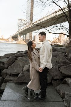 DUMBO Brooklyn engagement photos, Brooklyn engagement photographer, brooklyn couple photos, nyc couple aesthetic, playful couple poses, brooklyn bridge engagement, brooklyn photographer, brooklyn couples shoot, brooklyn location ideas, couples posing ideas, engagement outfit inspo, monochromatic couple outfit, casual engagement photos, intimate couples photography, candid couples photography, unique couples poses Couple Outfit Casual, Playful Couple Poses, Nyc Couple Aesthetic, Brooklyn Bridge Engagement Photos, Playful Couple, Nyc Couple, Casual Engagement Photos, Intimate Couples, Dumbo Brooklyn