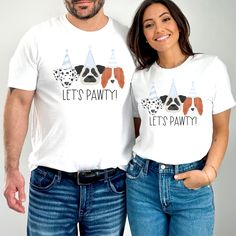 a man and woman standing next to each other wearing t - shirts that say let's pawty