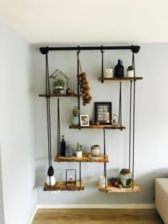 some shelves are hanging on the wall