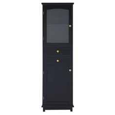 a tall black cabinet with two drawers and gold knobs on the doors, in front of a white background