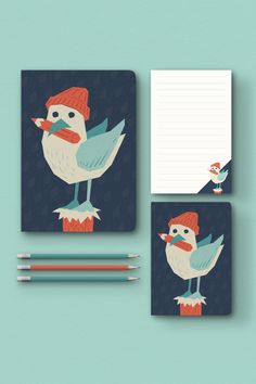 two birds with hats and pencils on top of each other next to an empty notepad