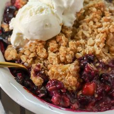 a bowl filled with fruit and ice cream