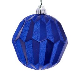 a blue ornament hanging from a string