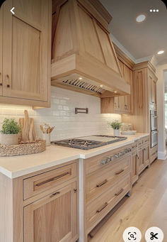 Kitchen Cabinets - Clean Wooden Blends. Oak and Pine Accents. White oak kitchen cabinets are experiencing a surge in popularity, capturing the attention of homeowners and designers alike for their natural elegance and timeless appeal.   Oak Cabinets Home Decor Home Renovations Home DIY Home Ideas Home Design Outdoor Renovations Pinterest Trends DIY Cozy Cabin Aesthetic Brick Fireplace Home Trends Nails Fall Outfits Home Design Mini Home Gym Fall Office Decor Fall Colors Patio Ideas Light Color Wood Cabinets, White Oak Kitchen Range Hood, Light Wooden Cabinets, Oak Kitchen Cupboards, White Oak Stained Cabinets, White Oak And White Kitchen, Rift Sawn White Oak Cabinets, Light Oak Kitchen Cabinets, White Oak Kitchens