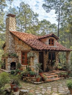 a small stone house surrounded by trees and plants