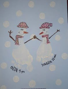 two snowmen wearing hats and holding hands