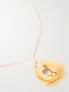 Designed in collaboration with sculptor and designer Simone Bodmer-Turner, AGMES' 'Gertude' necklace is inspired by modern architecture and art. It's been handmade in NYC with a recycled gold vermeil pendant that's strung on a smooth, tie-fastening cord - you can easily adjust it to suit your outfit. Sculptural Necklace, Recycled Necklaces, Simplicity Fashion, Flat Dress Shoes, Room Fragrances, Raffia Bag, Vermeil Jewelry, Fine Jewelry Designers, Recycled Gold