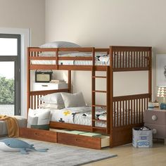 a bedroom with bunk beds and drawers in the corner, next to a window that looks out onto a patio