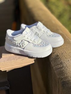 Let your little ones step out in style with our custom Air Force One Nike shoes, specially designed for toddlers and kids! These iconic sneakers blend classic design with vibrant colors and personalized touches that reflect your child's personality. Crafted with soft, durable materials, these shoes provide ultimate comfort and support for growing feet. The lightweight construction ensures ease of movement, perfect for all their adventures, whether they're playing at the park or heading to school.  Choose option to add their name or initials for a personalized flair. With a cushioned insole and a secure fit, these shoes are made to keep up with your energetic child while making a bold fashion statement. Available in toddler and youth sizes, our custom Air Force Ones are not just shoes; they Custom Air Force Ones, Playing At The Park, Iconic Sneakers, Af1 Nike, Custom Af1, Toddler Sneakers, Air Force One, Force One, Children Shoes