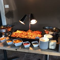 a buffet table filled with lots of food