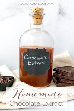 homemade chocolate extrait in a glass bottle with chalkboard label on the front and side