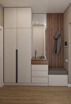 a white and wood room with some cabinets