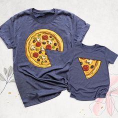 Pizza and Pizza Slice Shirt, Funny Fathers Day Tshirt, Matching Family Pizza Shirts, Daddy and Me Outfit, Dad and Son Shirt, Pizza Lover Tee. Hello, Thanks for your support. Your gladness comes first and all work is done with Love in here. Always keep your support, please:) Pizza and Pizza Slice  Shirts are branded Bella+Canvas.  Pizza and Pizza Slice  Shirt  Contents: - Solid colors: %100 Cotton.  - Heather colors: %52 Cotton + %48 Polyester* This ultra-soft graphic tee is made from a comfortab Mother's Day Cartoon Print Short Sleeve T-shirt, Family Matching Blue T-shirt With Cartoon Print, Blue Family Matching T-shirt With Cartoon Print, Funny Print Short Sleeve Shirt For Mother's Day, Family Matching Crew Neck Shirt With Cartoon Print, Printed Crew Neck Tops For Gifts, Printed Crew Neck Top As Gift, Casual Tops With Cartoon Print For Mother's Day, Casual Cartoon Print Top For Mother's Day