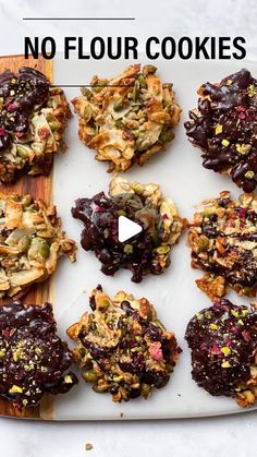 there are no flour cookies on the cutting board with words above it that read, no flour cookies