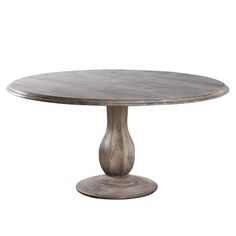 a round wooden table with an oval base