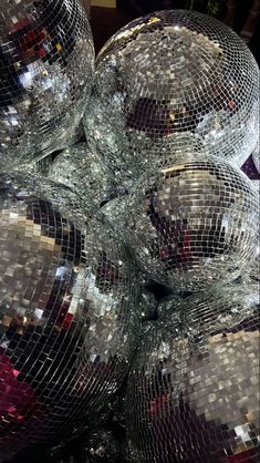 several disco balls are stacked on top of each other