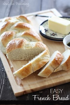 sliced bread and butter on a cutting board