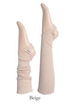 Introducing the MOMO Leg Warmer - a versatile and stylish accessory that's ready to add a touch of charm to your outfit. Crafted from a soft, ribbed blend of cotton and modal, these leg warmers offer both comfort and style. The ruffle finishing hem with vertical punching lines adds a delightful texture and detail.Designed to be wearable all year round. Wear them knee-high with a leotard or leggings for a classic look. For a trendy twist, try the ruched style with loose socks paired with shorts o Solid Ribbed Stretch Leg Warmers, Solid Stretch Ribbed Leg Warmers, Fitted Ribbed Leg Warmers For Spring, Solid Color Footless Leg Warmers For Spring, High Stretch Solid Legwear For Spring, Comfortable Cotton Stretch Leg Warmers, Solid Cotton Stretch Leg Warmers, Solid Stretch Cotton Leg Warmers, Comfortable Stretch Cotton Leg Warmers