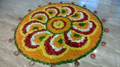 a circular flower arrangement on the floor