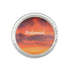 the bridesmaid sunset sky orange alert compact mirror is shown on a white background