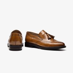 These loafers are crafted from premium calfskin to ensure comfort and durability. The classic brogue design is elevated by the trendy tassel detail, creating a unique and eye-catching shoe. Perfect for a day at the office or a night out with friends, these tassel brogue loafers will keep you looking stylish and feeling comfortable all day long. Upper Material: Calfskin Lining Material: Genuine Leather Outsole Material:Rubber Insole Material: Genuine Leather Heel Height: 2.4cm