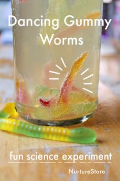 a glass jar filled with gummy worms