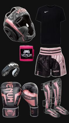 a black shirt and pink shorts with boxing gear on it, including a pair of gloves