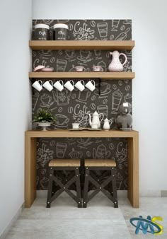 the shelves are decorated with chalk drawings and teapots