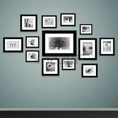 black and white photo frames are arranged on the wall in front of a gray background