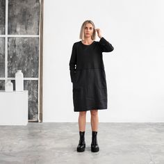 "Straight cut loose fit knee-length dress in a minimal style with two pockets. Made combing two fabrics. The top of the dress is made from a cotton jersey and the bottom is made from black linen. A breathable, lightweight combination of two textures makes this garment perfect for different body types. Please note that due to the many variations in monitors and browsers, actual colors may vary. Available in: black DETAILS * Model wearing black in size S is 5'6\" (171 cm) * Relaxed fit. Questions Fitted Knee Length Dress, Long Sleeve Black Dress, Walking Dress, Linen Dress Summer, Sleeve Black Dress, Black Linen Dress, Western Outfits Women, Midi Dress Black, Black Long Sleeve Dress